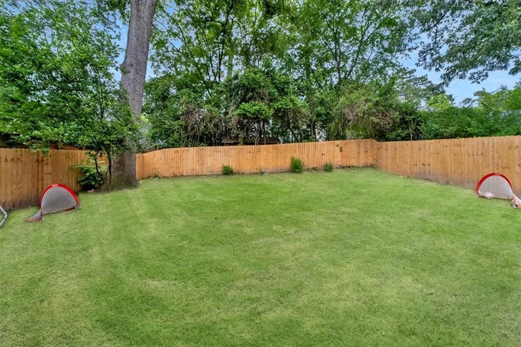 View of fenced backyard