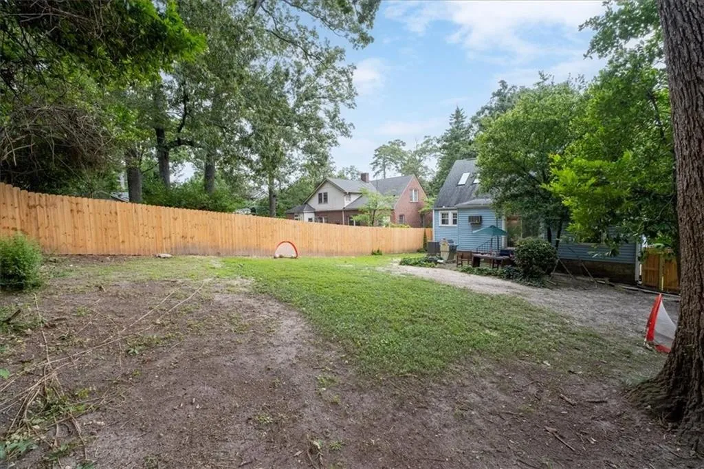 View of fenced backyard