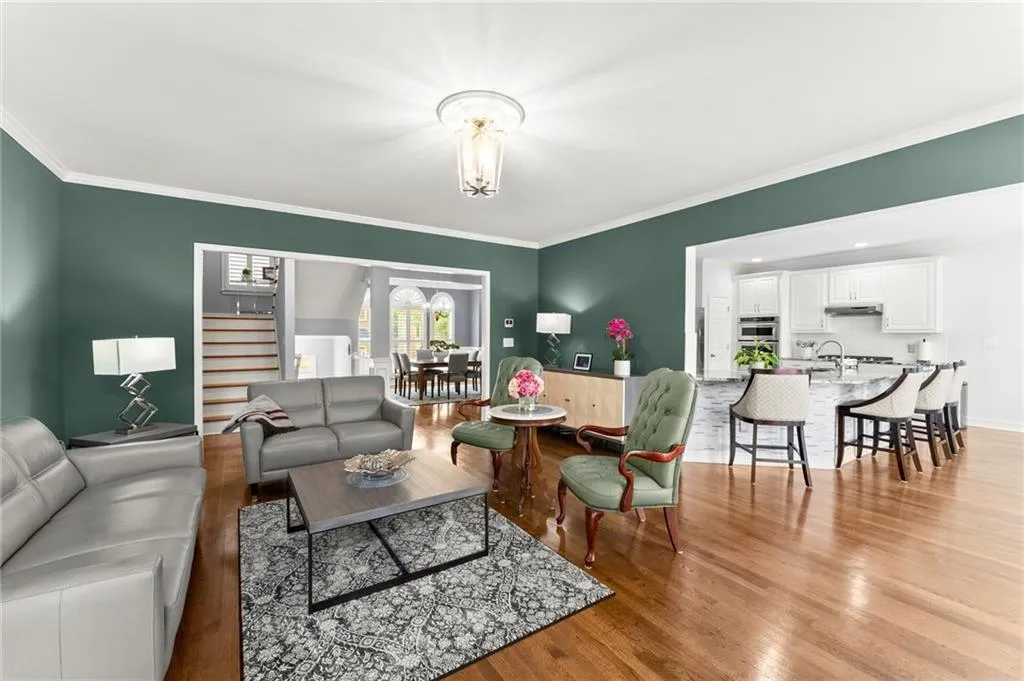 Living Room with view to kitchen and dining room.