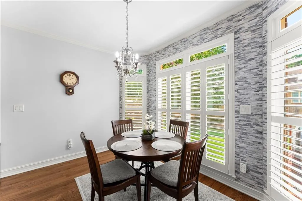 Breakfast area off of kitchen. View to living room & access to deck.