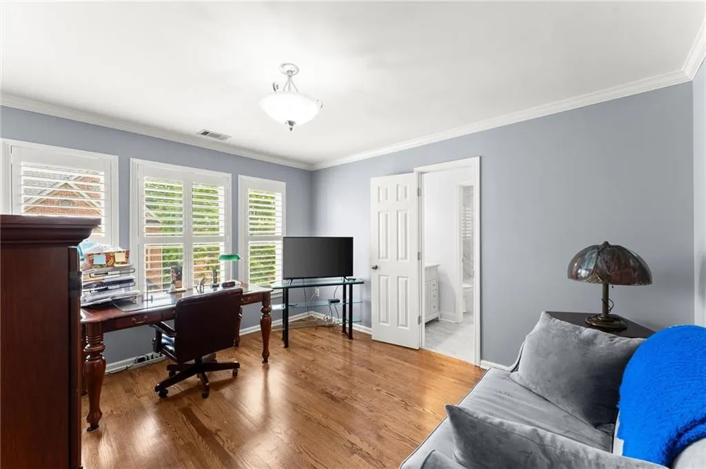 Secondary bedroom which is currently used as an office space.