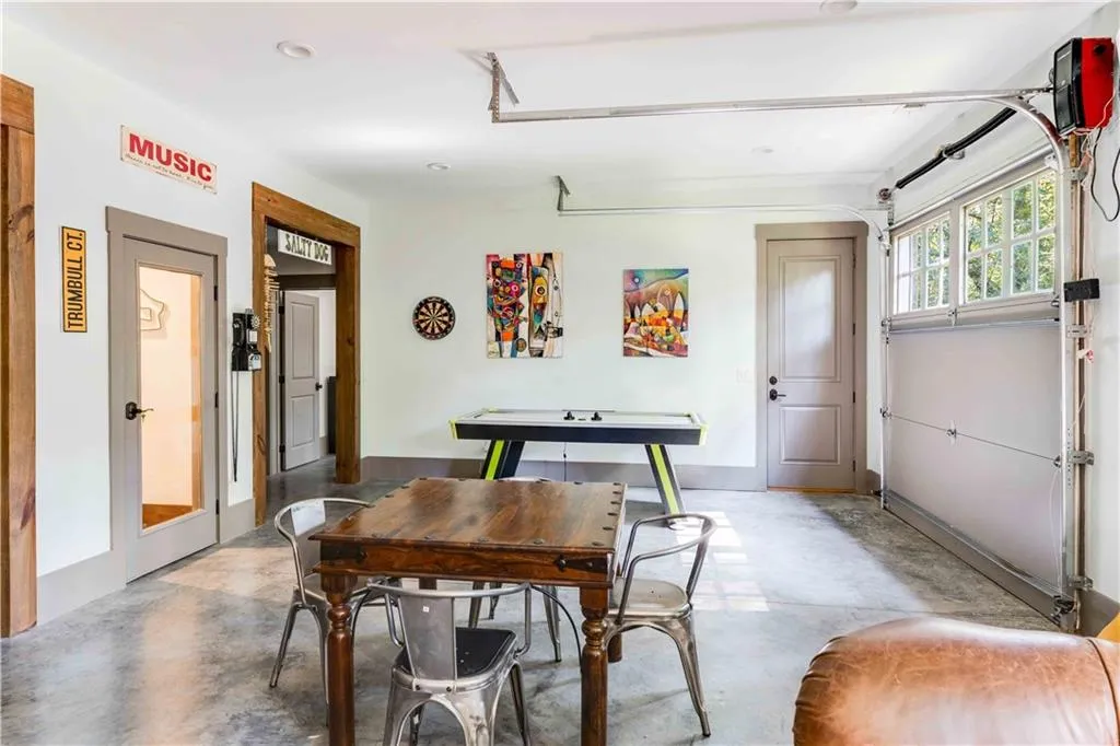 Dining space featuring concrete flooring