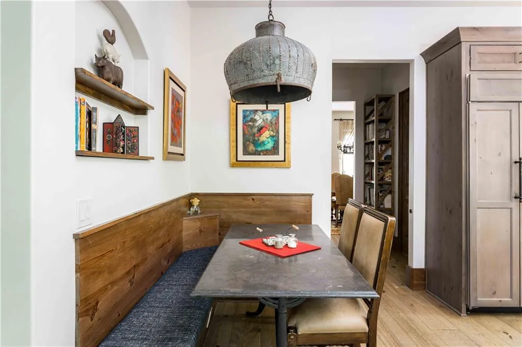 Dining area with light wood-type flooring