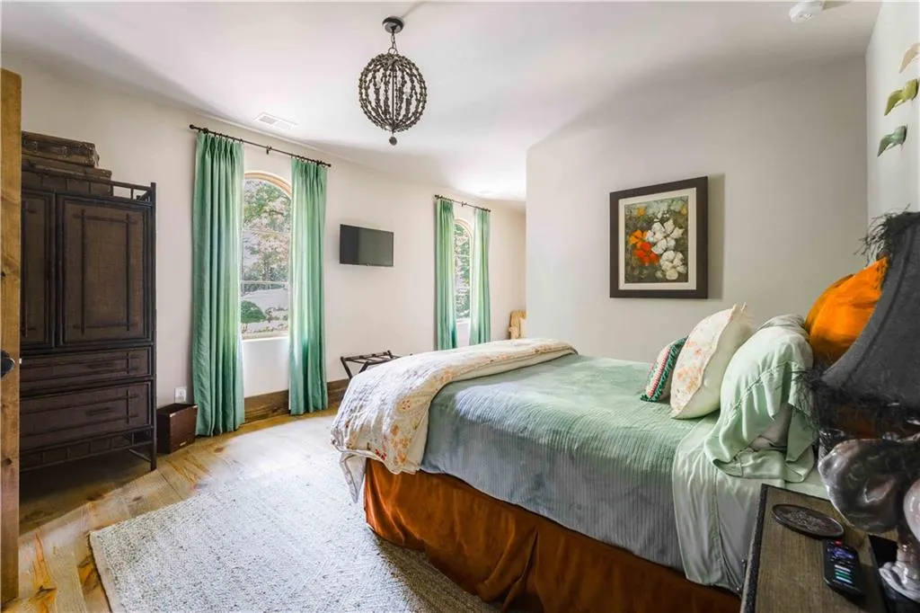 Bedroom with wood finished floors