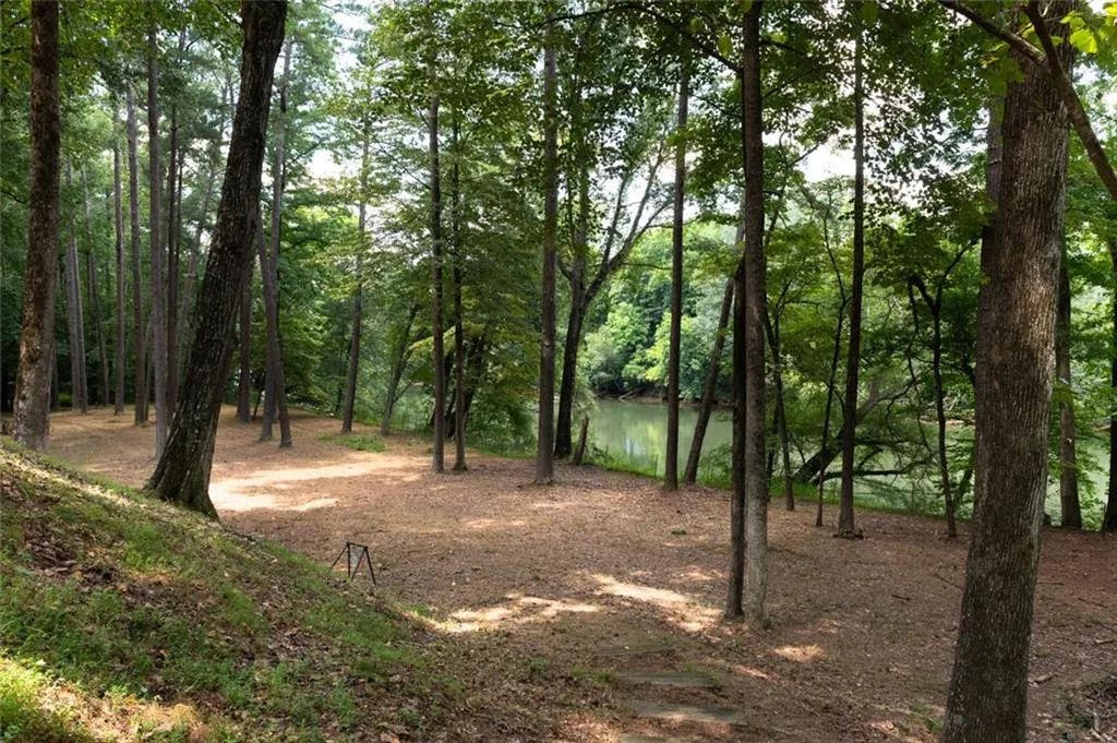 Huge level fenced area by the river for running, fishing, bow hunting & more!