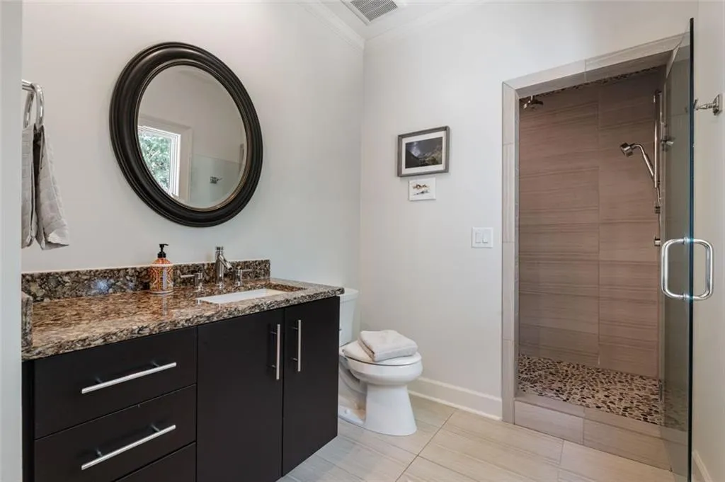 Renovated Bathroom with Built-In Closet