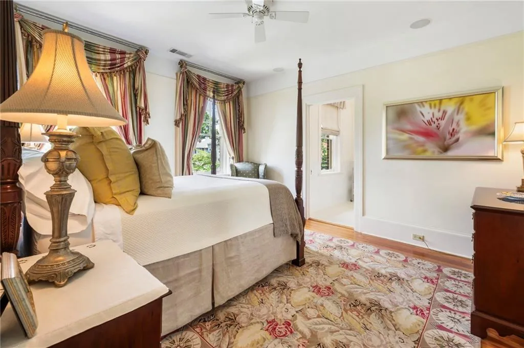 Bedroom with wood finished floors and ceiling fan