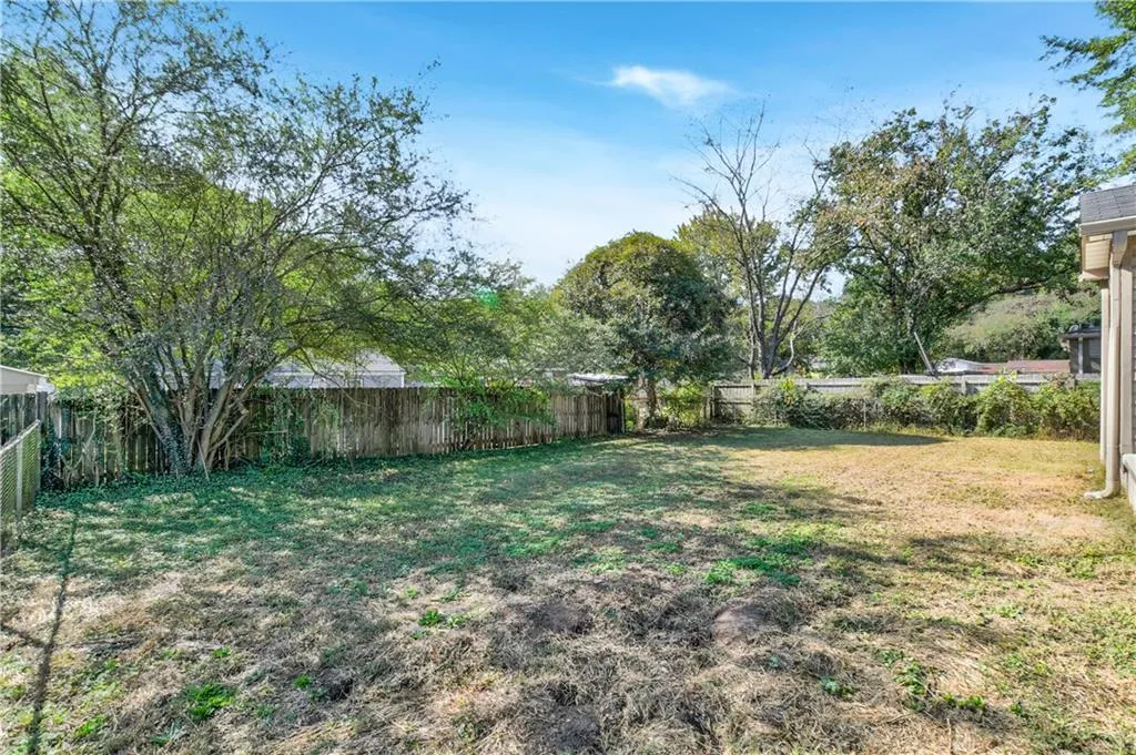 View of fenced backyard