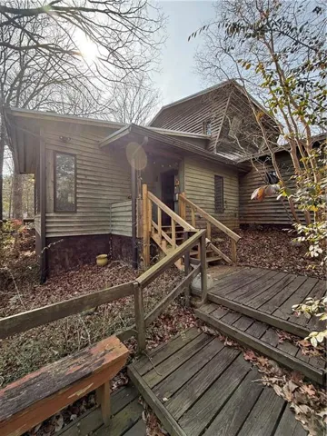 Wooden terrace featuring stairway