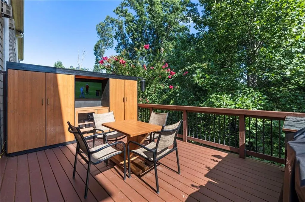 Wooden terrace with outdoor dining area