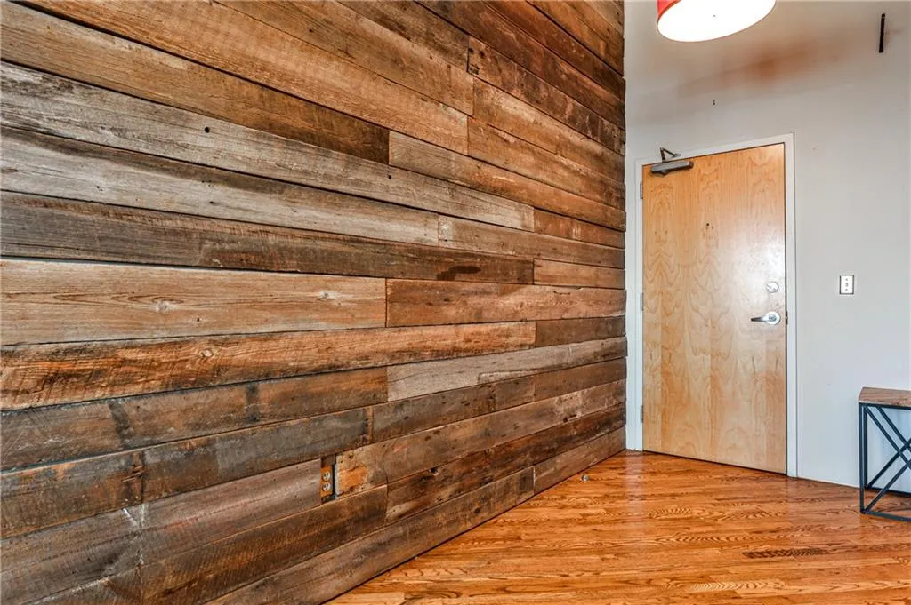 Entry with custom wood siding