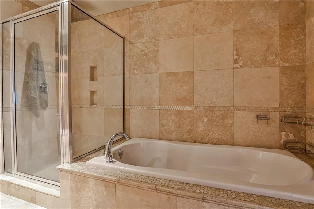 Master Bath with separate shower and soaking tub
