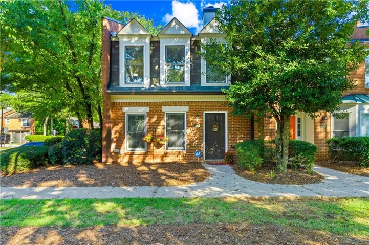 Brick exterior facade with white trim