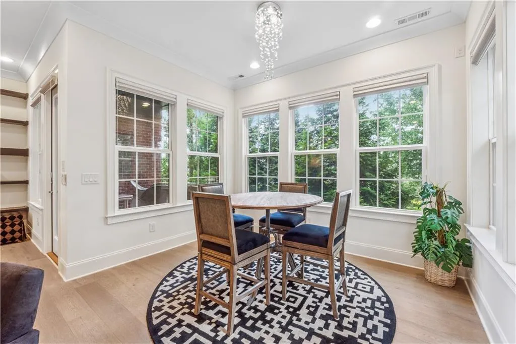 Sunroom is so light and bright and can be used in so many ways....office, lounge reading area, breakfast area, piano space, you name it.