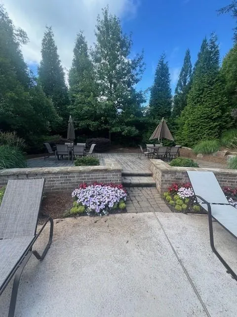 Abundant seating areas around the private community pool