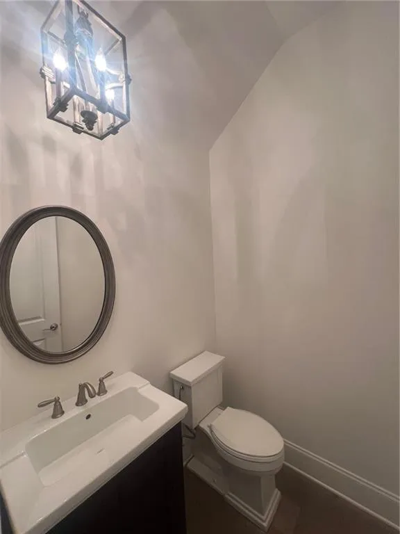 Main floor powder room with high ceiling