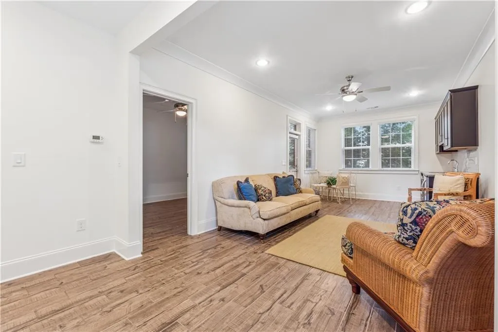 Terrace level retreat with its own entrance has a separate room which could be a bedroom, office, work-out room....whatever you need.
