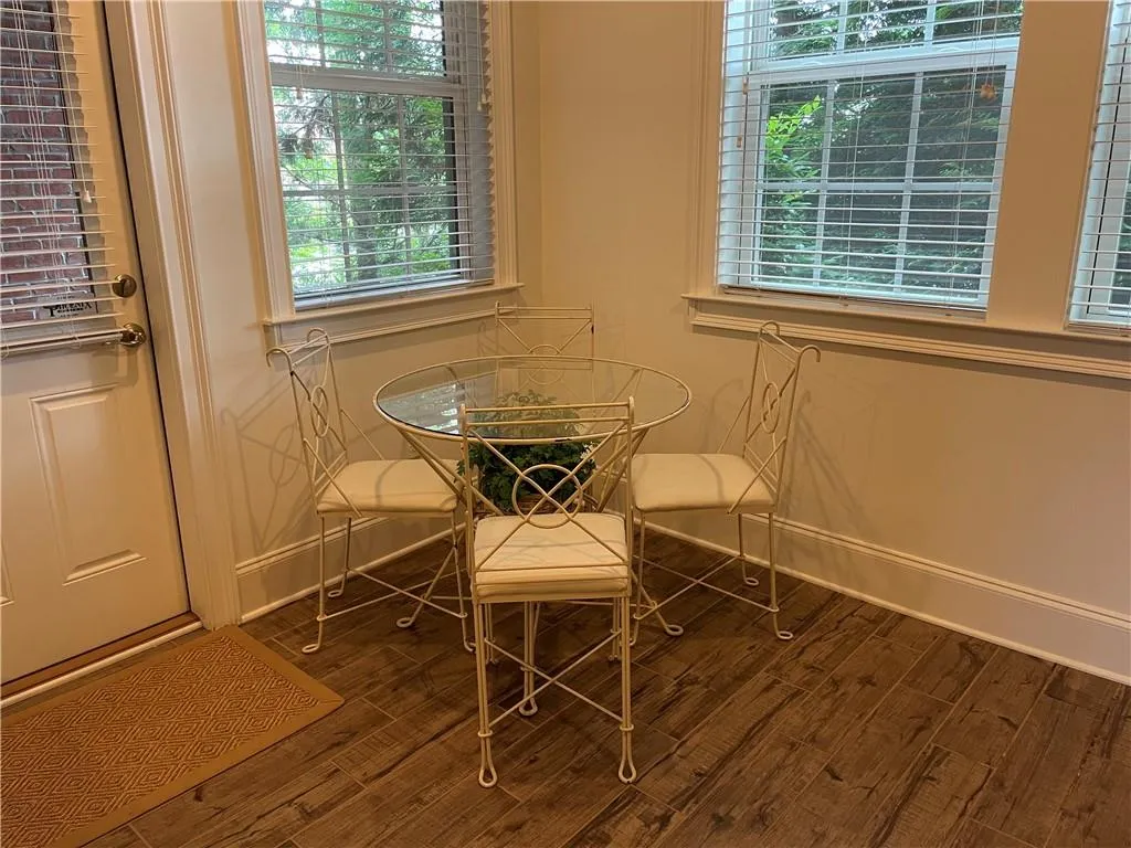 Terrace level dining area.  Lots of windows for natural light and private access door to outside.