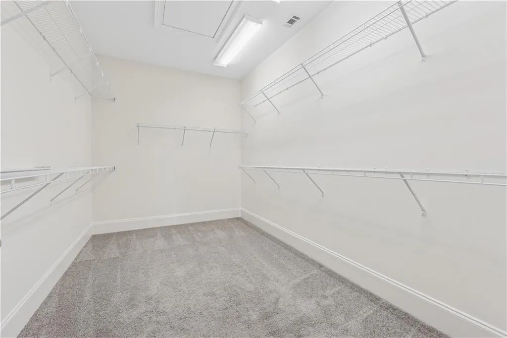 Primary walk-in closet is gigantic