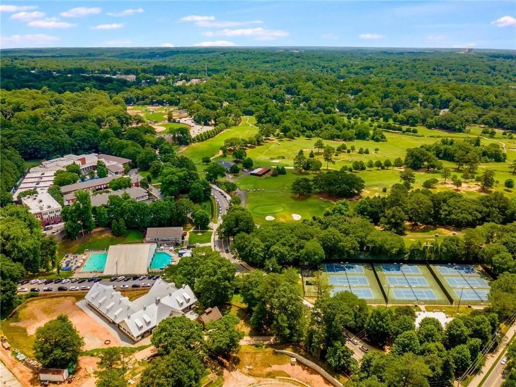 Bird's eye view of a forest and a golf club