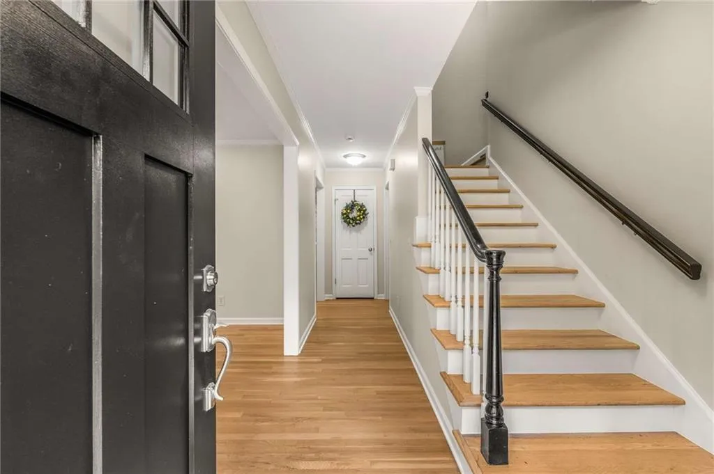 Entrance with steps to upstairs.