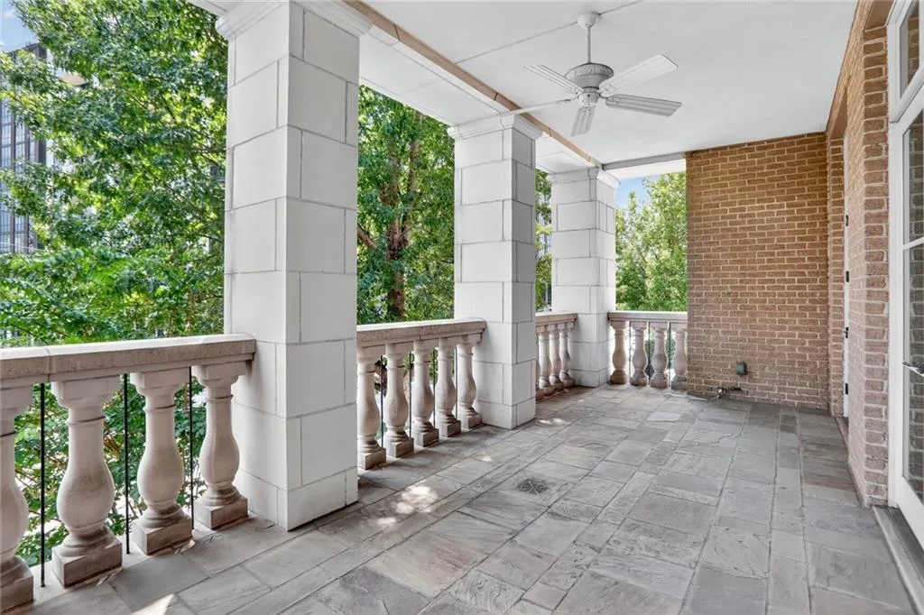 View of patio featuring a ceiling fan