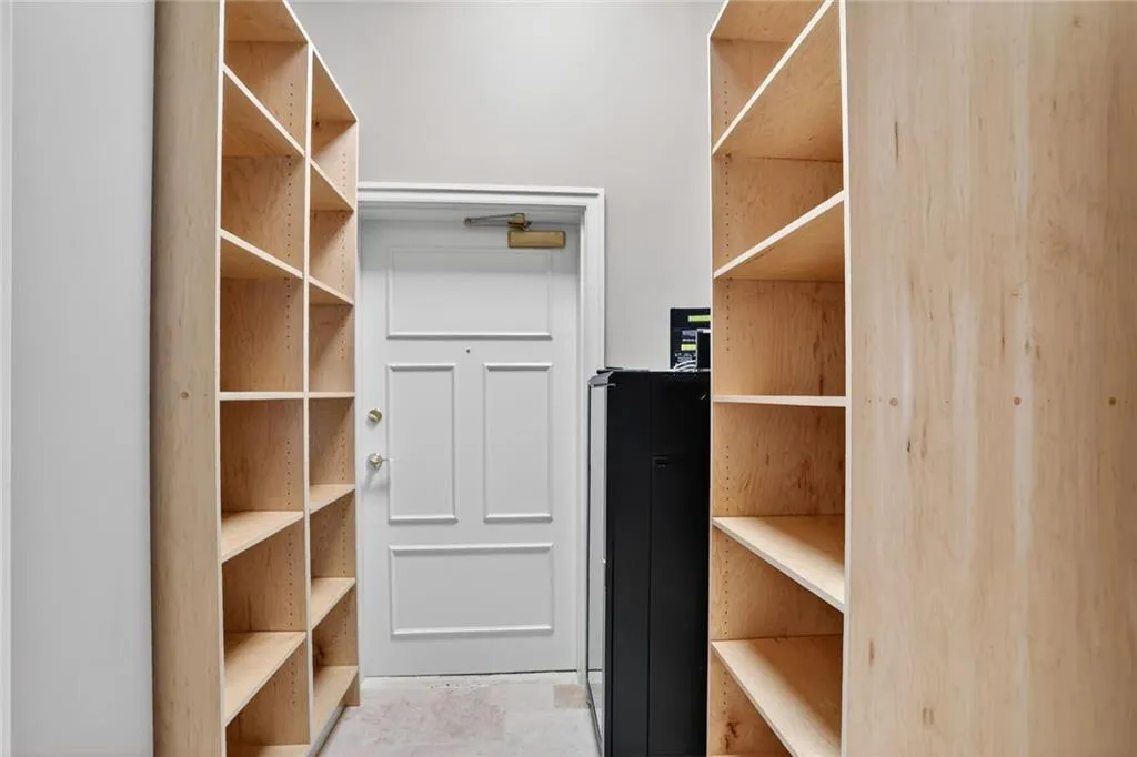 View of one of many spacious storage closets located off the main level.