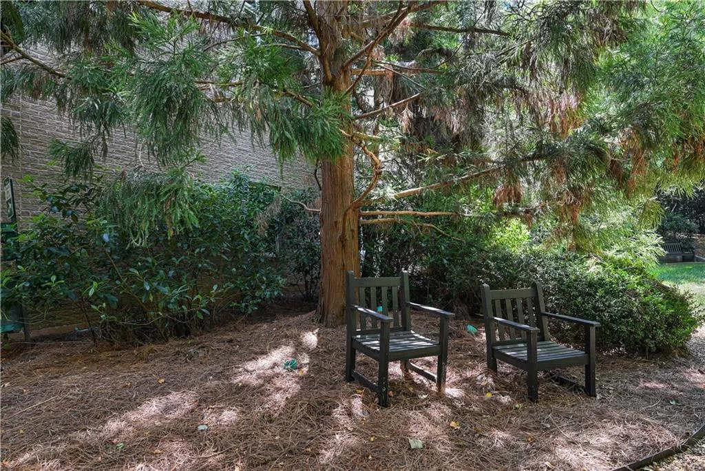 View of private greenspace and pathway behind property
