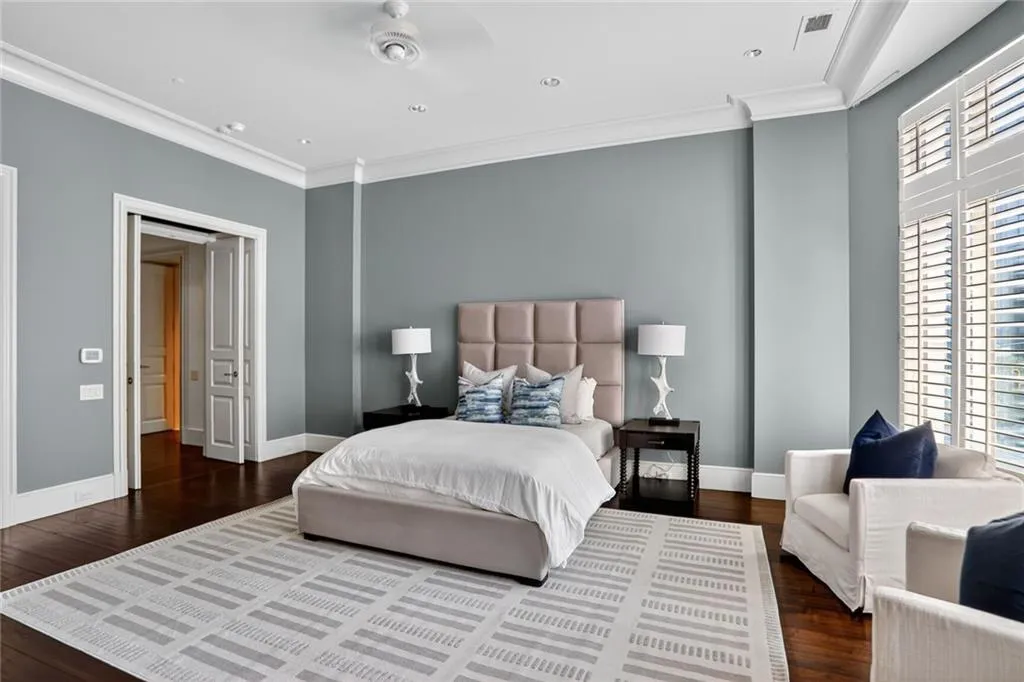 Bedroom featuring crown molding, dark wood-style floors, and recessed lighting
