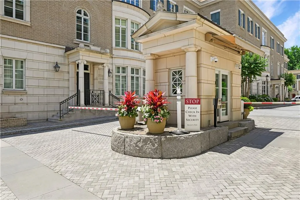 View of property entrance with guard tower