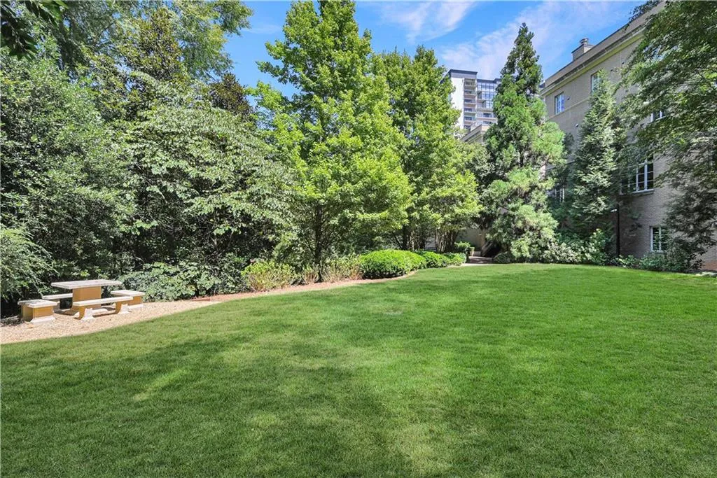 View of private greenspace and pathway behind property