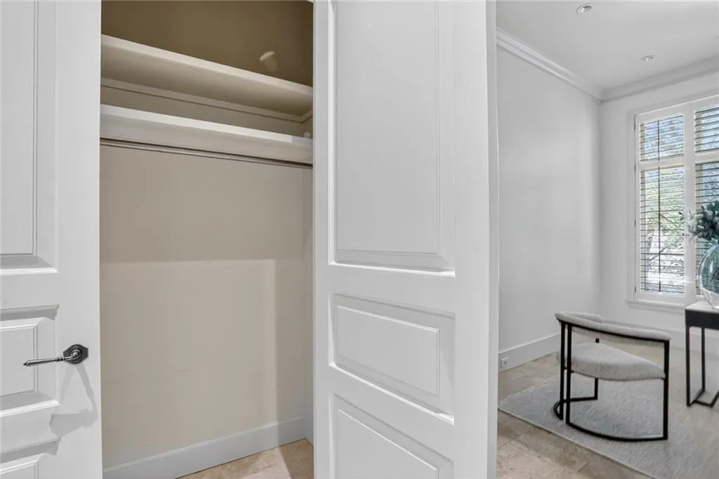 Additional closet off of Office/Bonus Room with built in shelving.