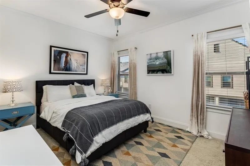 Oversized primary suite offers an abundance of sun