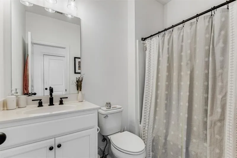 Upstairs secondary bathroom is ensuite, and offers