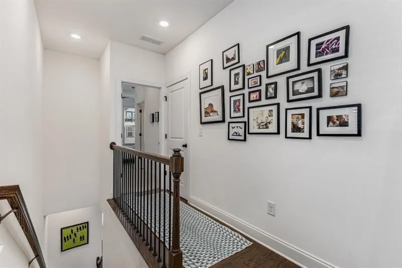 Hall with an upstairs landing, wood finished floor