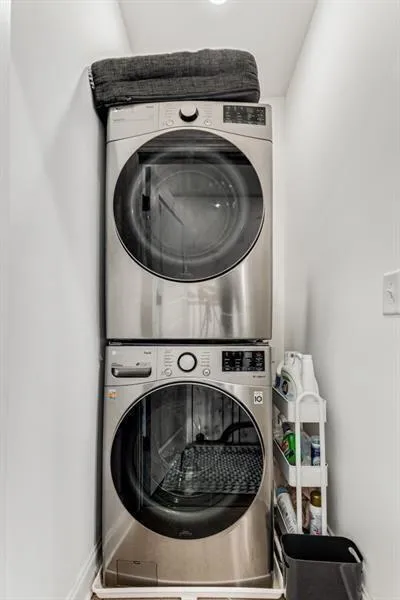 Upstairs laundry room is located in close proximit