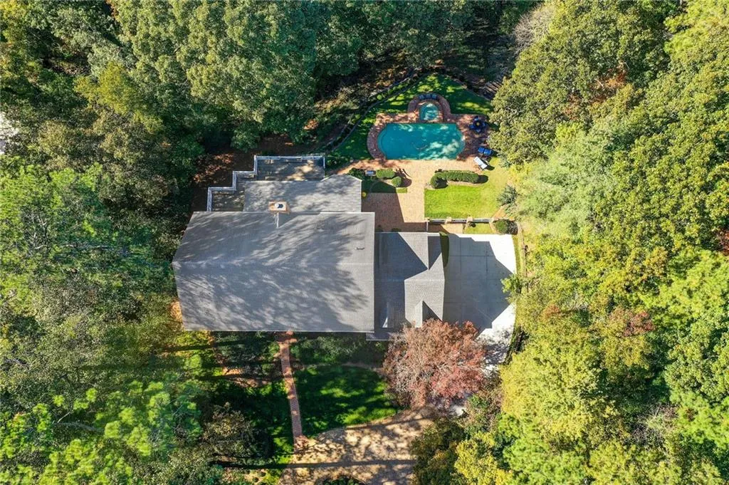 View from above of property with a pool area
