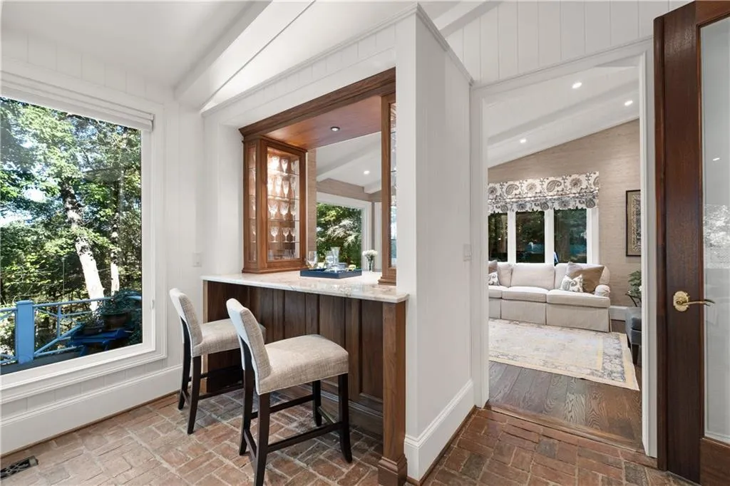 This custom bar is opens to the sunroom, deck, keeping room and kitchen This custom bar is opens to the sunroom, deck, keeping room and kitchen