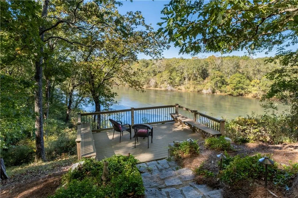 Dock with a wooded view and a deck with water view Dock with a wooded view and a deck with water view