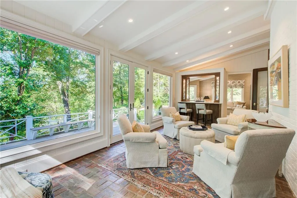 What a beautiful space for coffee, a glass of wine and reading! Double French doors lead to the patio over looking the pool-spa  and Chattahoochee River . What a beautiful space for coffee, a glass of wine and reading! Double French doors lead to the patio over looking the pool-spa  and Chattahoochee River .