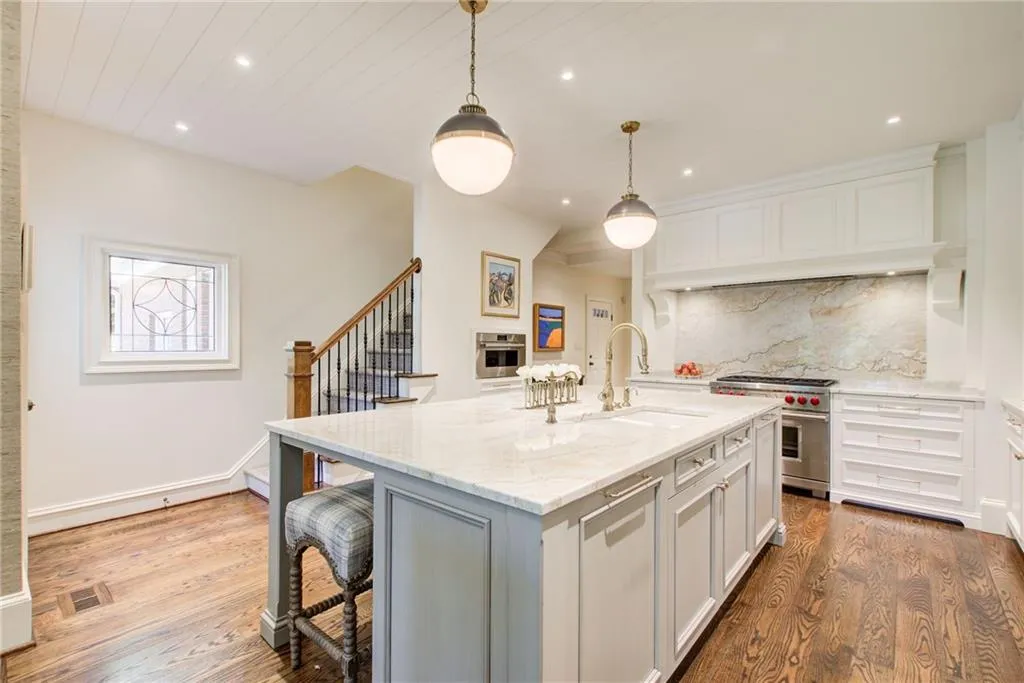 Beautiful hardwood flooring, designer lighting, back stairs and  commercial appliances....this kitchen is a must see! Beautiful hardwood flooring, designer lighting, back stairs and  commercial appliances....this kitchen is a must see!