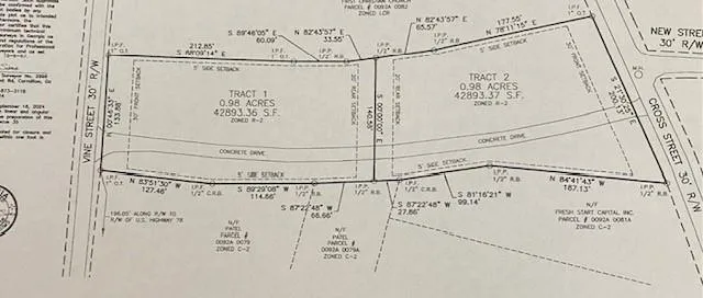 Property Survey. Illustrating two tracts of land, dimensions, and adjacent street names