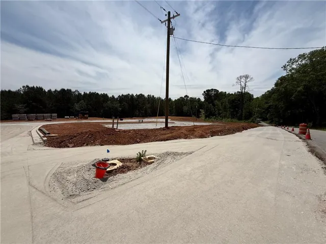 68-unit approved Townhome Development close to the University of West Georgia. Overview of deceleration lane, future mail kiosk and picklelball area.