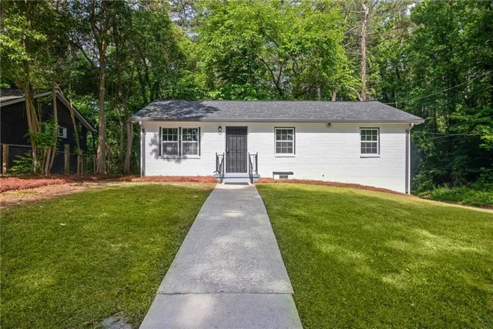 Level beautiful yard with a practically "NEW" home