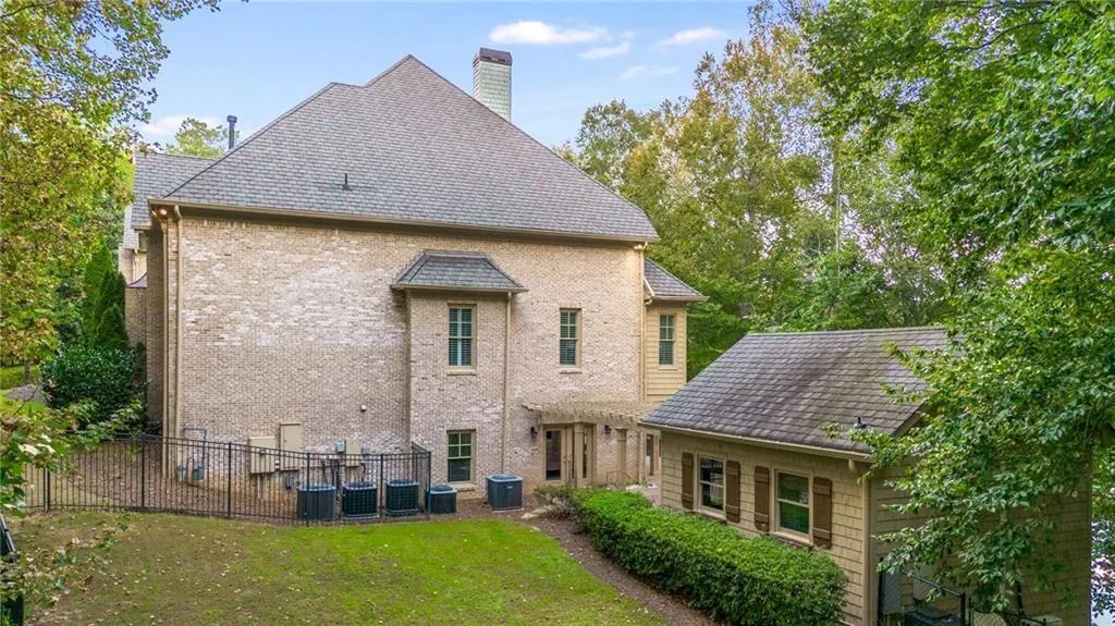 Fenced side yard adjacent to the guest/pool house.