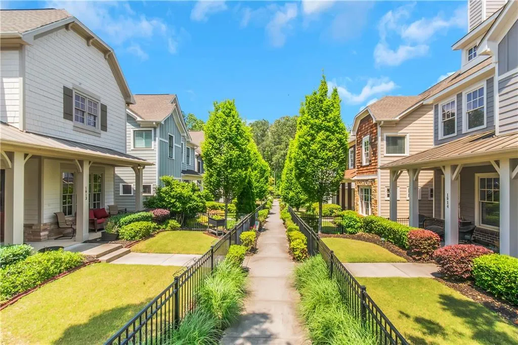 View of yard with a fenced backyard and a residential view