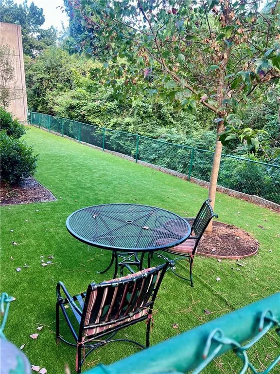 Fenced dog park with new turf