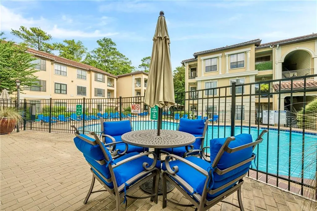 Balcony with view of pool