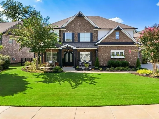 Brick and siding exterior with a two-story design