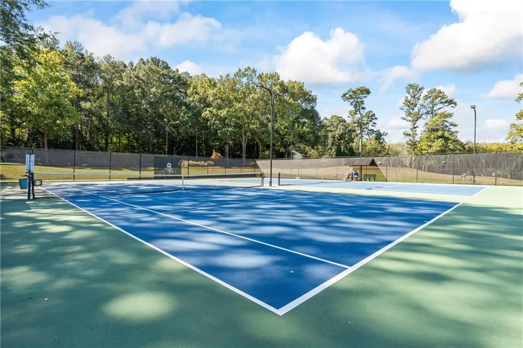 Your backyard backs up to the tennis courts!